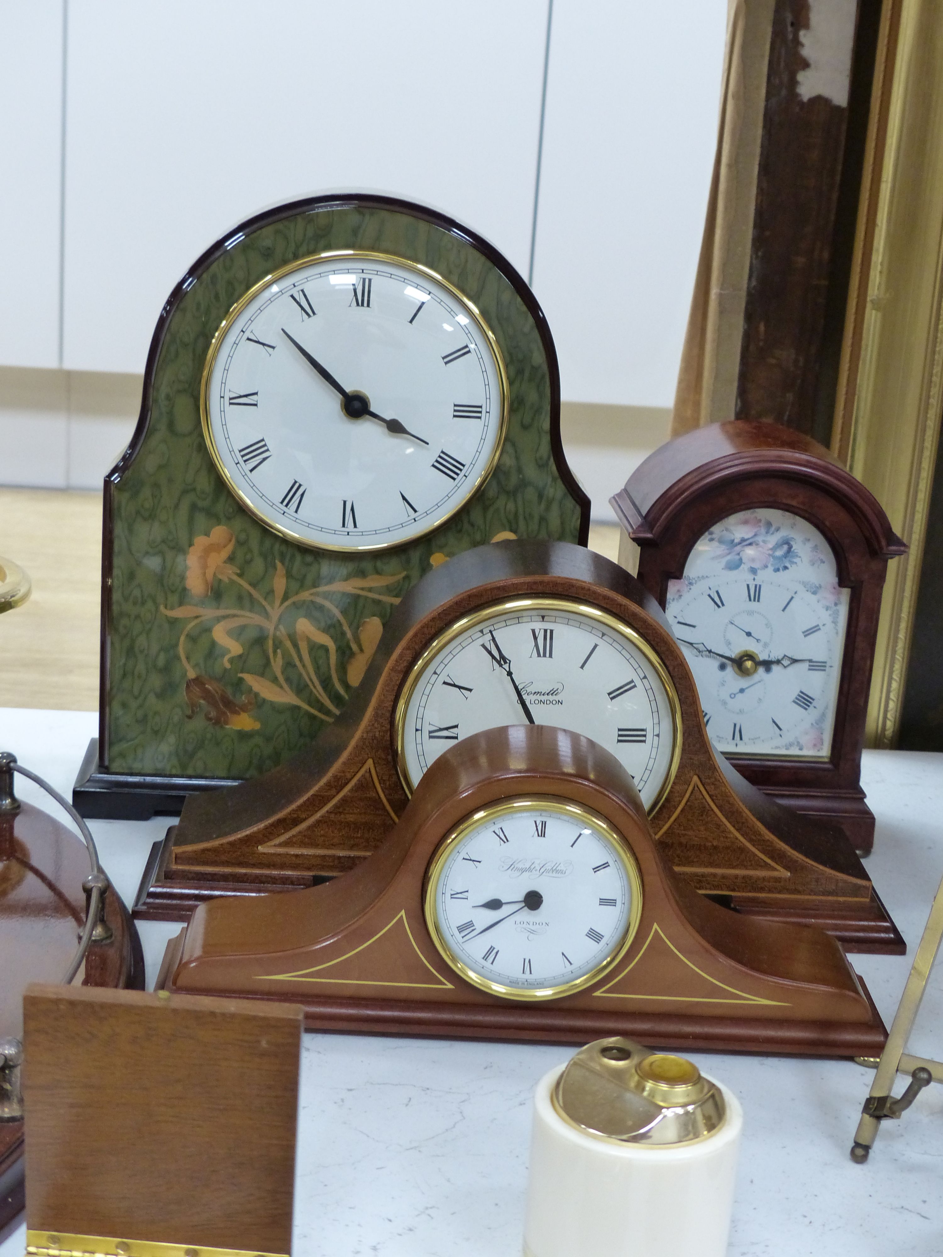 Miscellaneous items, including a brass counter bell, an oval inlaid mahogany galleried tray and four various mantel clocks